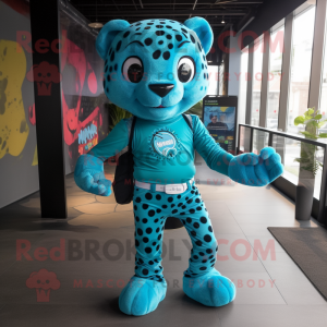 Turquoise Jaguar mascot costume character dressed with a Romper and Messenger bags