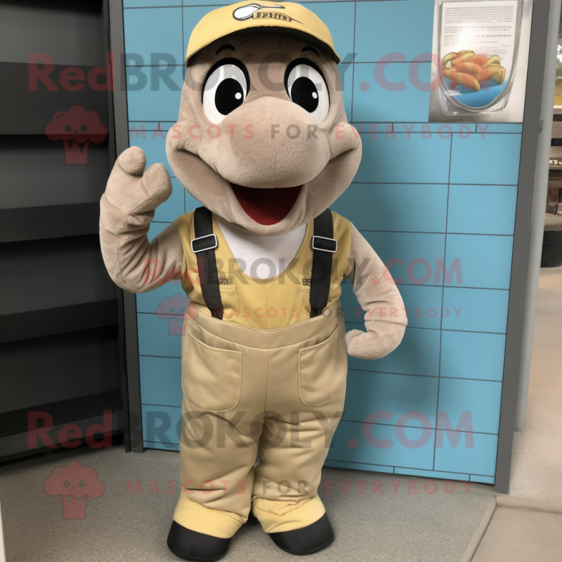Tan Python mascot costume character dressed with a Dungarees and Handbags Tan Python mascot costume character dressed with a Dungarees and Handbags
