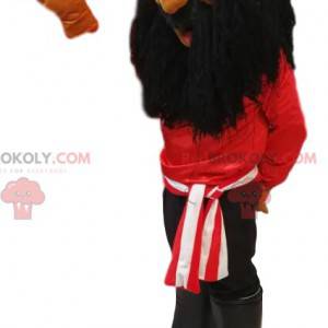 Mascota pirata con una camiseta roja y una larga barba negra. -
