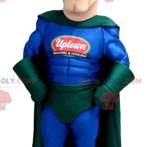 Mascote super-herói em traje azul e verde - Redbrokoly.com