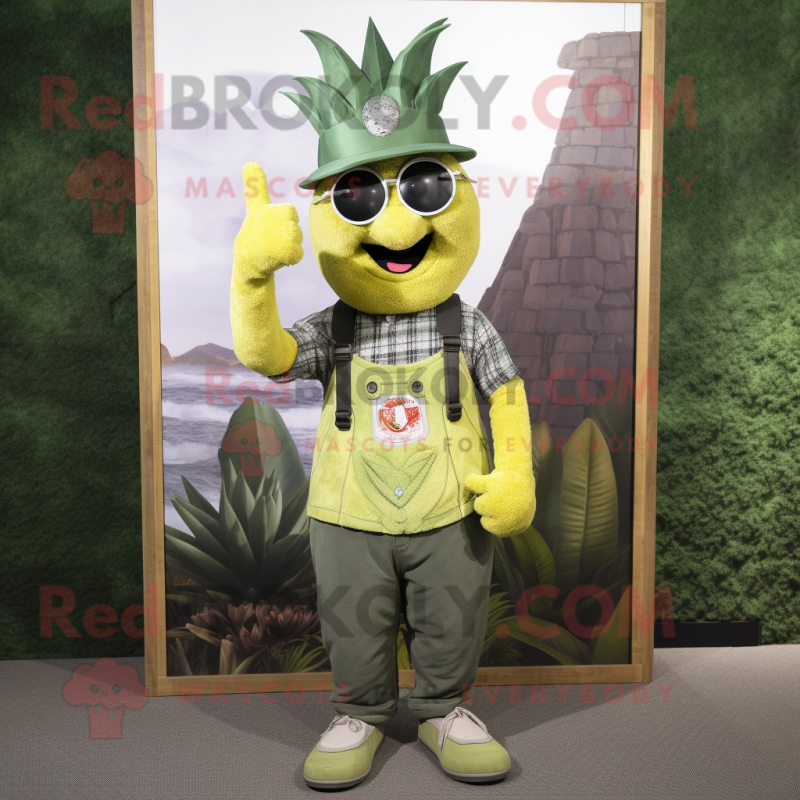Olive Pineapple mascot costume character dressed with a Dungarees and Bracelet watches Olive Pineapple mascot costume character dressed with a Dungarees and Bracelet watches