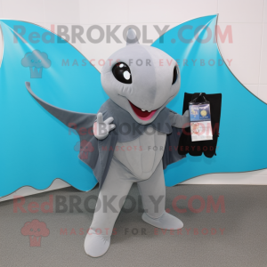 Magenta Manta Ray mascot costume character dressed with a Capri