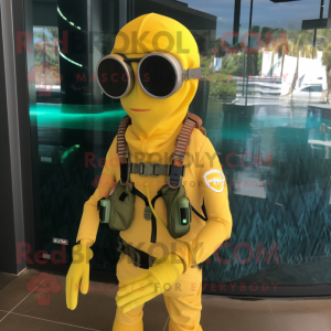 Yellow Marine Recon mascot costume character dressed with a Swimwear and Scarf clips