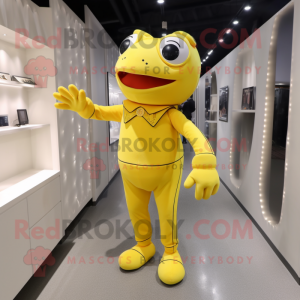 Yellow Frog mascot costume character dressed with a Jumpsuit and Foot pads