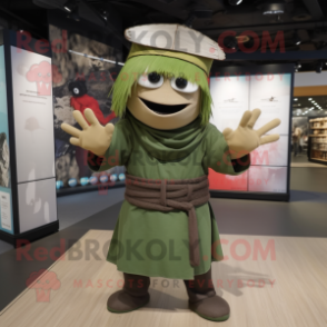 Olive Samurai mascot costume character dressed with a Maxi Dress and Caps