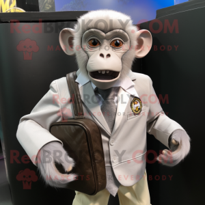 Silver Capuchin Monkey mascot costume character dressed with a Suit Jacket and Messenger bags