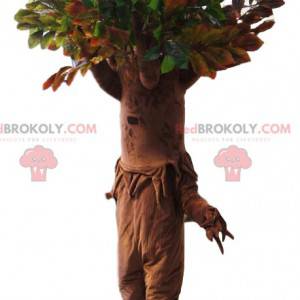 Mascotte d'arbre avec un superbe houppier vert. Costume d'arbre