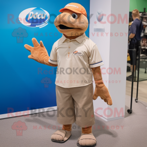 Tan Salmon mascot costume character dressed with a Polo Shirt and Earrings