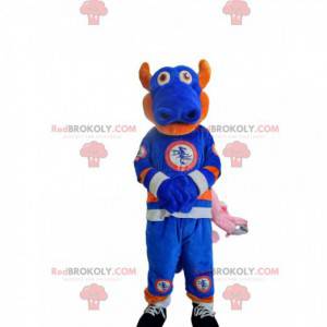 Mascotte drago blu e arancione in abbigliamento sportivo. -