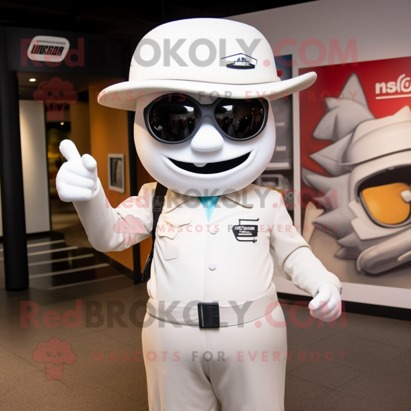 White Aglet mascot costume character dressed with a Moto Jacket and Hat pins White Aglet mascot costume character dressed with a Moto Jacket and Hat pins