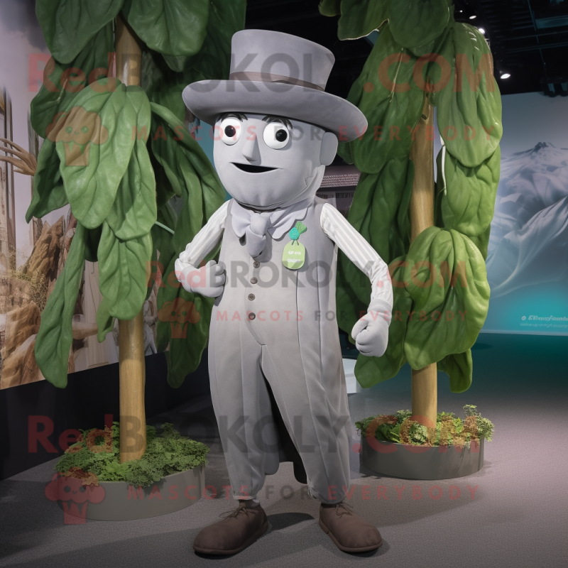 Gray Beanstalk mascot costume character dressed with a Oxford Shirt and Hat pins Gray Beanstalk mascot costume character dressed with a Oxford Shirt and Hat pins