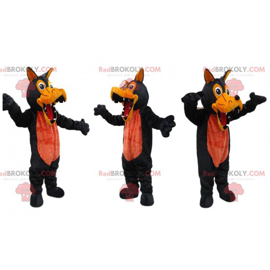 Mascota lobo negro y naranja con dientes grandes -