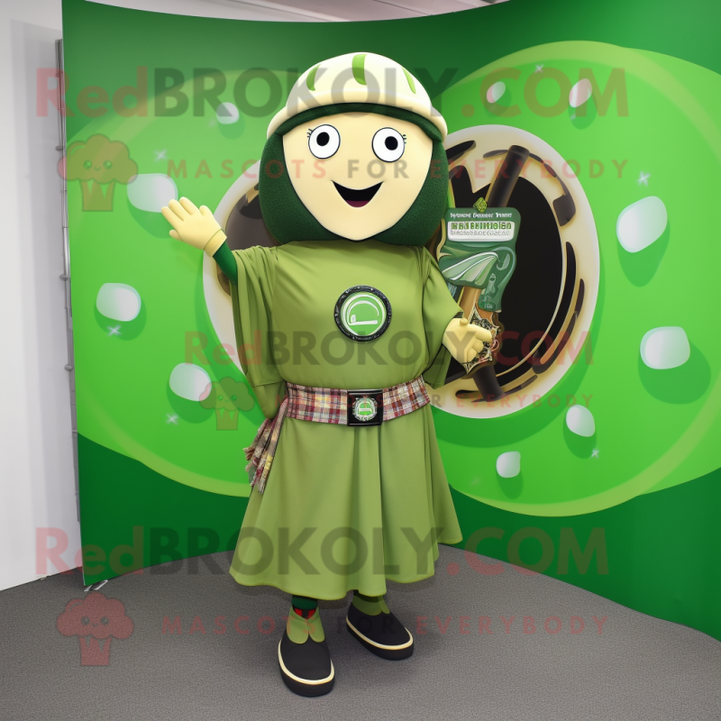 Olive Celtic Shield mascot costume character dressed with a Skirt and Berets Olive Celtic Shield mascot costume character dressed with a Skirt and Berets