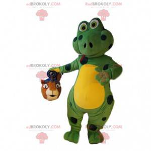 Mascot green lizard with black polka dots. Lizard costume. -