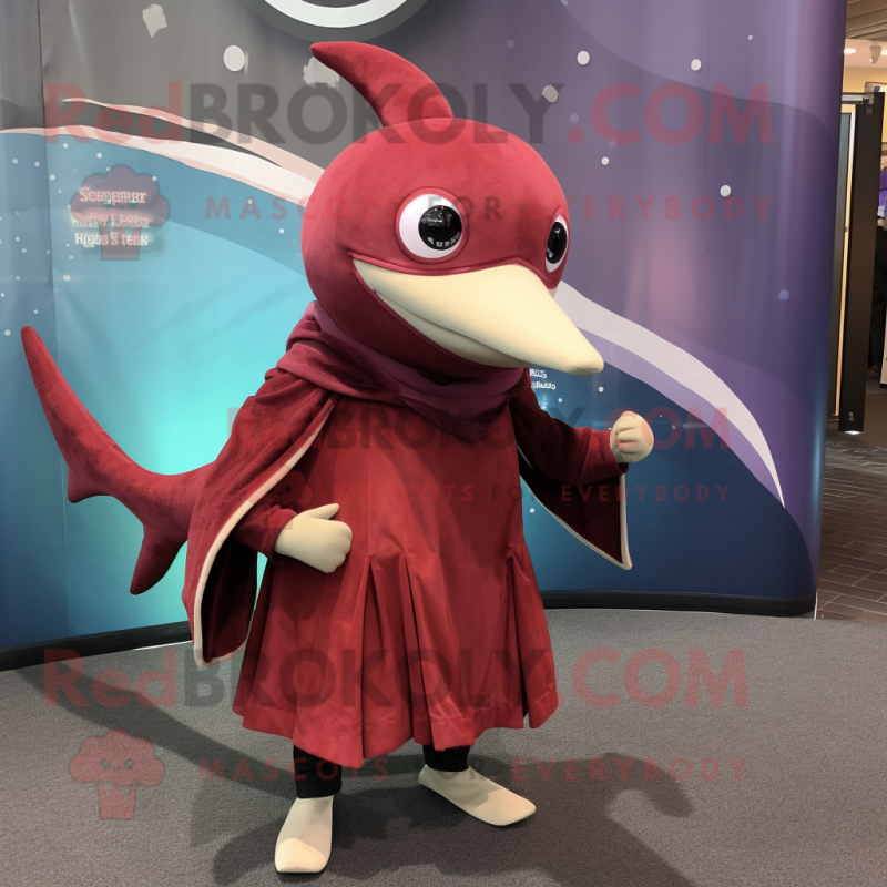 Maroon Swordfish mascot costume character dressed with a Skinny Jeans and Shawls