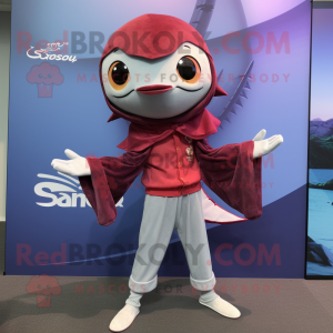 Maroon Swordfish mascot costume character dressed with a Skinny Jeans and Shawls