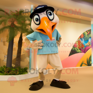 Tan Toucan mascot costume character dressed with a Capri Pants and Watches