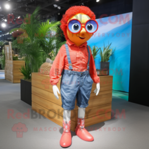 Red Clown Fish mascot costume character dressed with a Denim Shorts and Sunglasses