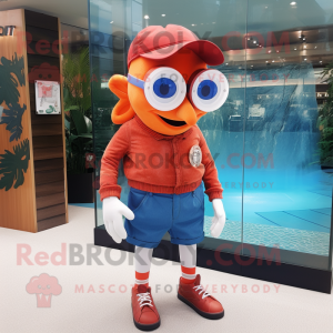 Red Clown Fish mascot costume character dressed with a Denim Shorts and Sunglasses