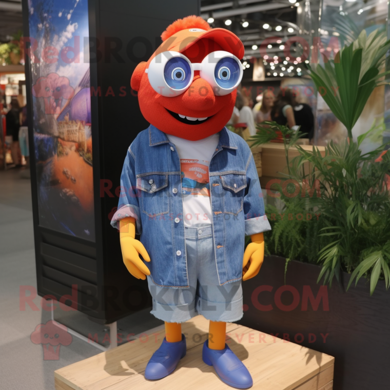 Red Clown Fish mascot costume character dressed with a Denim Shorts and Sunglasses