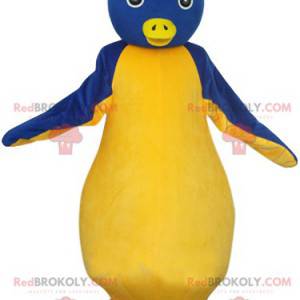 Niebiesko-żółta maskotka pingwina z ładnymi oczami. -