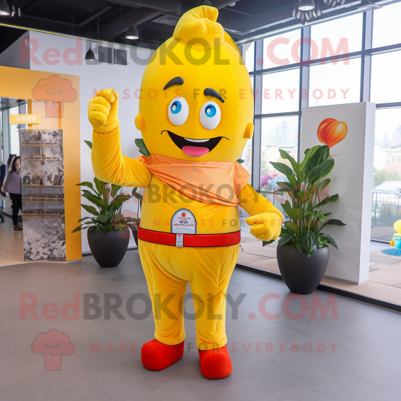 Yellow Apricot mascot costume character dressed with a Flare Jeans and Gloves