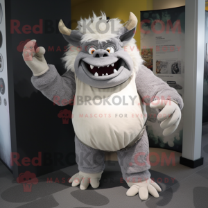 Gray Ogre mascot costume character dressed with a Romper and Cummerbunds