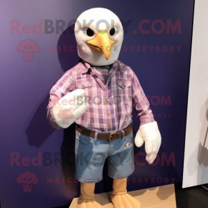 Lavender Bald Eagle mascot costume character dressed with a Jeans and Keychains