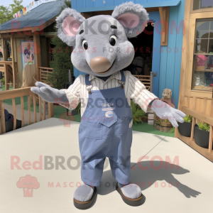 Gray Sow mascot costume character dressed with a Chambray Shirt and Shoe clips