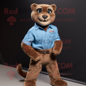 Brown Jaguarundi mascot costume character dressed with a Chambray Shirt and Shoe clips