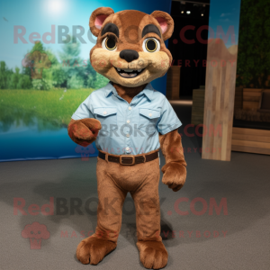 Brown Jaguarundi mascot costume character dressed with a Chambray Shirt and Shoe clips