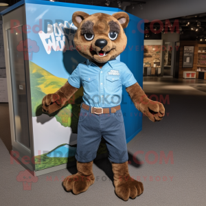 Brown Jaguarundi mascot costume character dressed with a Chambray Shirt and Shoe clips