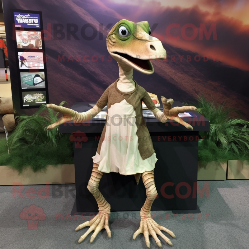 Tan Coelophysis mascot costume character dressed with a Wrap Skirt and Shoe clips Tan Coelophysis mascot costume character dressed with a Wrap Skirt and Shoe clips
