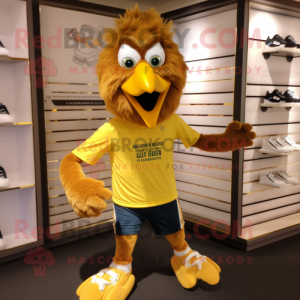 Gold Eagle mascot costume character dressed with a Running Shorts and Necklaces