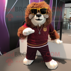 Maroon Tamer Lion mascot costume character dressed with a Henley Tee and Sunglasses