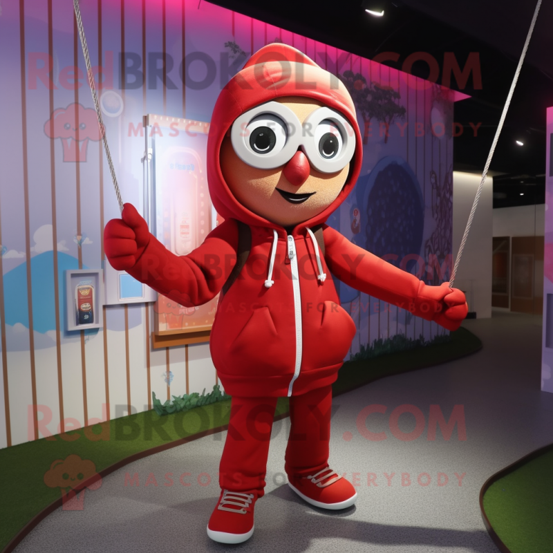 Red Tightrope Walker mascot costume character dressed with a Hoodie and Handbags Red Tightrope Walker mascot costume character dressed with a Hoodie and Handbags