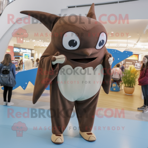 Brown Manta Ray mascot costume character dressed with a Jeggings and Mittens