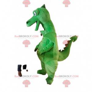 Mascotte de dragon vert super souriant. Costume de dragon -