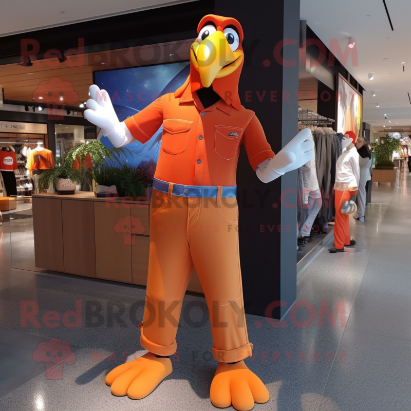 Orange Toucan mascot costume character dressed with a Mom Jeans and Cufflinks