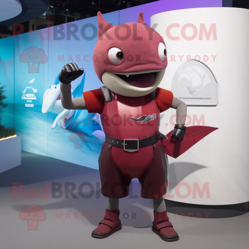 Maroon Swordfish mascot costume character dressed with a Tank Top and Smartwatches