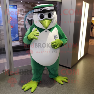 Green Penguin mascot costume character dressed with a Dress Shirt and Bracelet watches