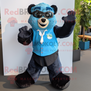 Blue Spectacled Bear mascot costume character dressed with a Poplin Shirt and Foot pads
