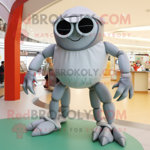 Silver Crab mascot costume character dressed with a Culottes and Eyeglasses