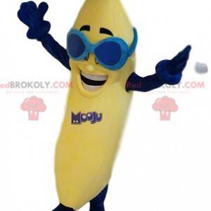 Veselý banánový maskot s modrými slunečními brýlemi -