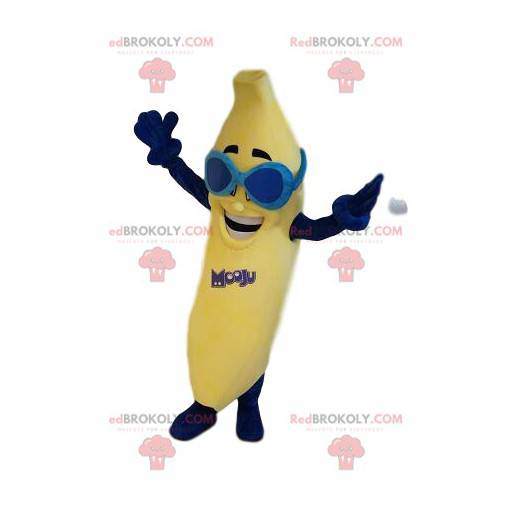 Mascotte de banane joyeuse, avec des lunettes de soleil bleues