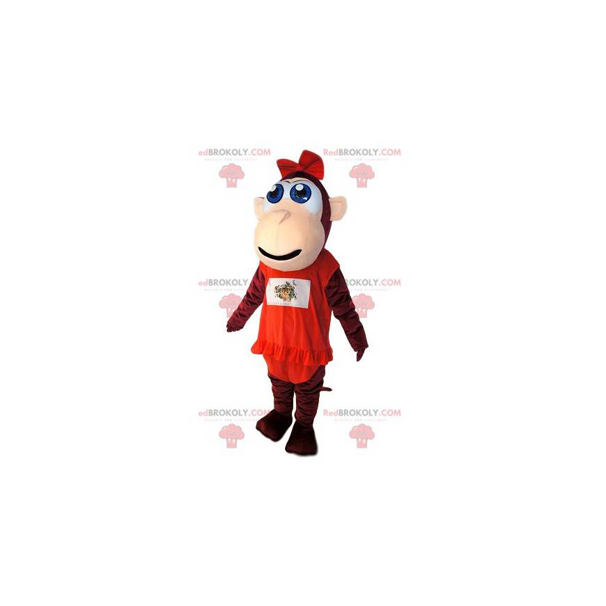 Mascot mono marrón, con un vestido rojo con volante. -