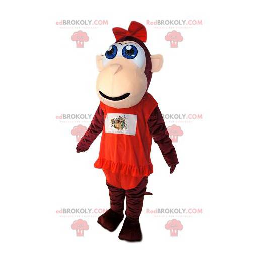 Macaco mascote marrom, com vestido vermelho com babado. -