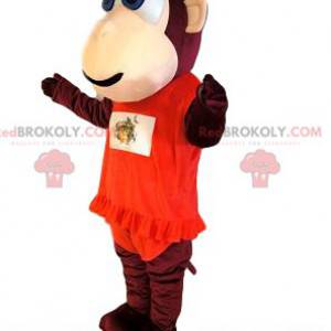 Bruine aap mascotte, met een rode jurk met volant. -