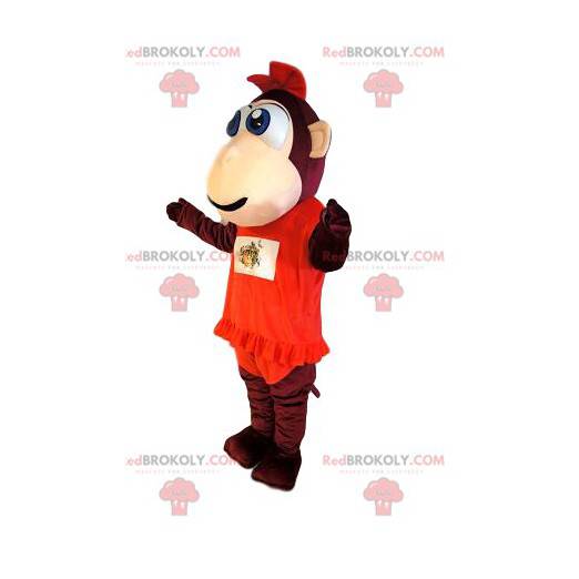 Bruine aap mascotte, met een rode jurk met volant. -