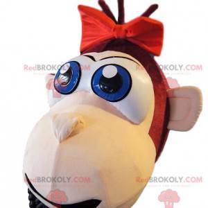 Mascot brown monkey, with a red dress with flounce. -